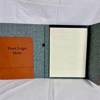 Notebook with a brown leatherette pocket inside to store business cards and lined pages