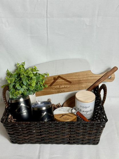 Beautiful white marble cutting board, matching coaster set, wine bottle opener, 2 wine tumblers, wooden spoon, and a plant.